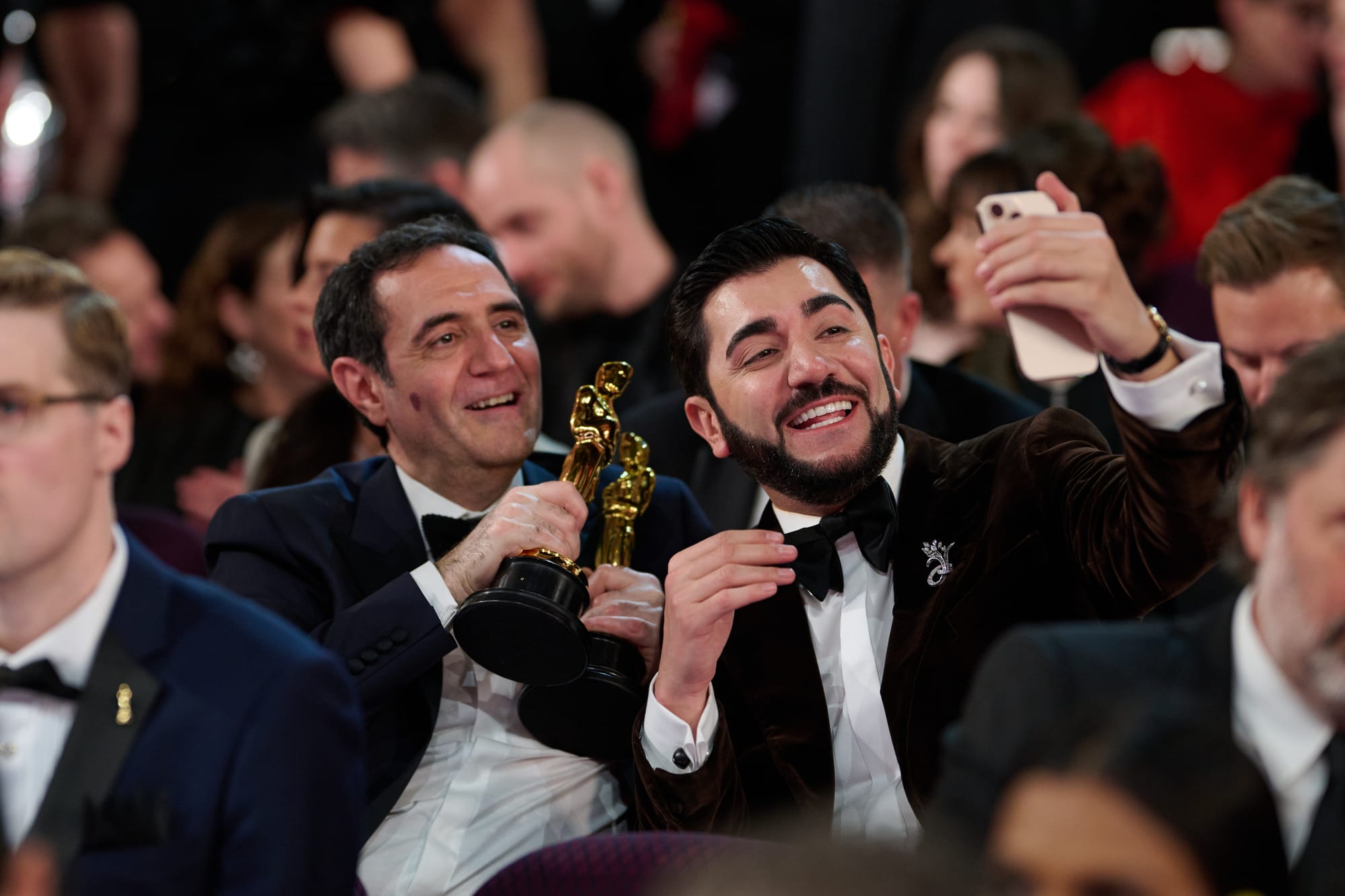 Karren Karagulian and Vache Tovmasyan pose with the Oscar® for Best Picture during the live ABC Telecast of the 97th Oscars® at the Dolby® Theatre at Ovation Hollywood on Sunday, March 2, 2025.